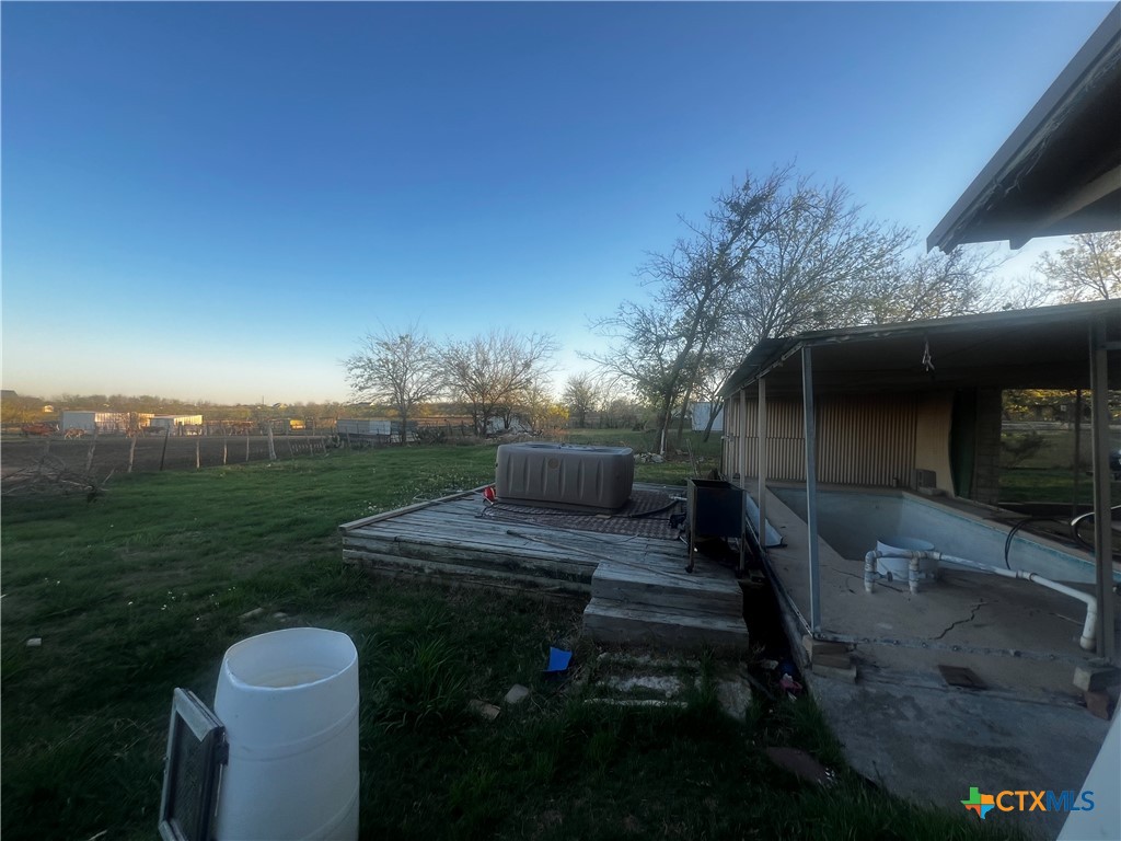 605 East Rogers Cemetery Road Rogers, TX 76569 - Photo 26 of 29 a view of a house with backyard