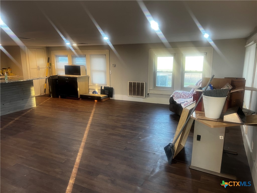 605 East Rogers Cemetery Road Rogers, TX 76569 - Photo 6 of 29 a living room with furniture and a wooden floor