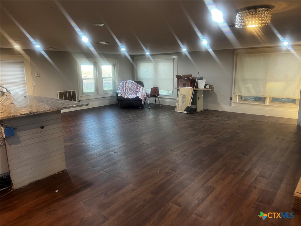 605 East Rogers Cemetery Road Rogers, TX 76569 - Photo 9 of 29 a view of a room with gym equipment