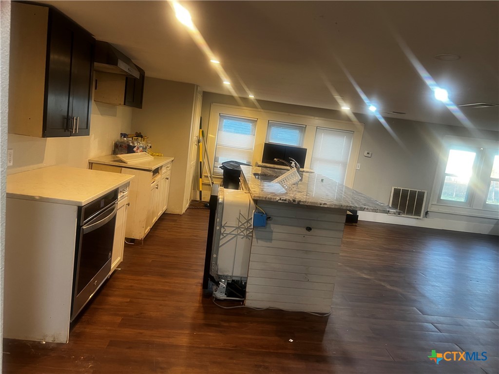 605 East Rogers Cemetery Road Rogers, TX 76569 - Photo 10 of 29 a kitchen with counter top space and appliances