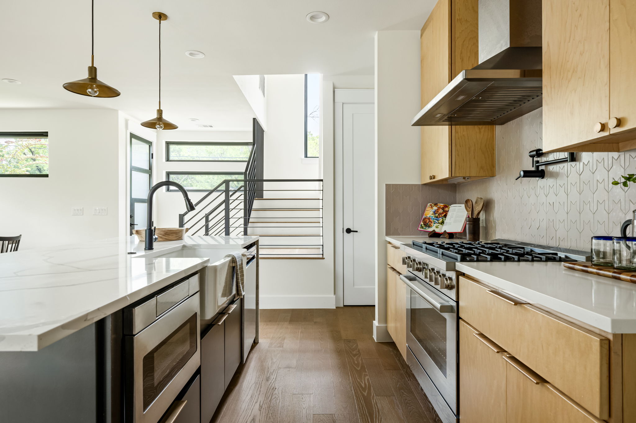 3508 Lyons Road Austin, TX 78702 - Photo 6 of 40 Culinary excellence awaits in this well-appointed kitchen, featuring hardwood flooring and ample counter space.