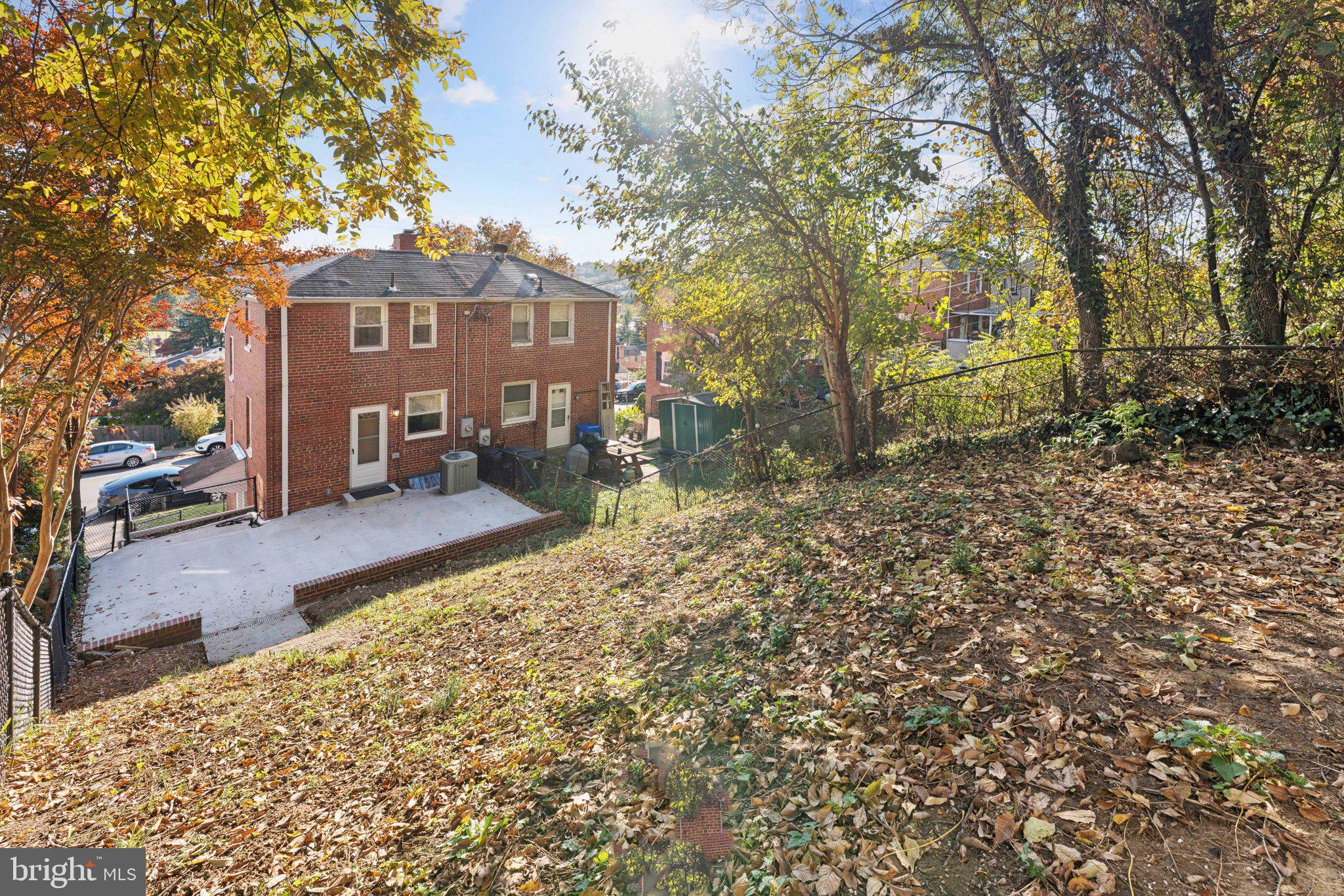 3621 South Kemper Road Arlington, VA 22206 - Photo 21 of 22 a view of a house with a yard and sitting area