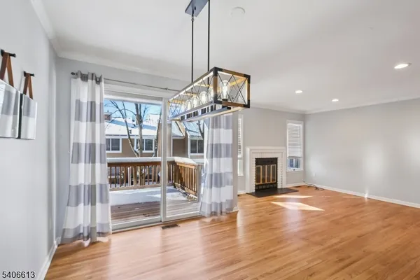 a kitchen with stainless steel appliances granite countertop a refrigerator and a stove