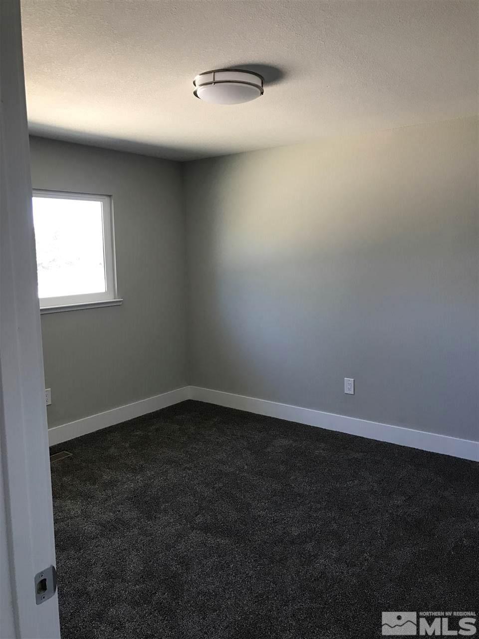 270 River Boat Road Dayton, NV 89403 - Photo 8 of 10 an empty room with a window