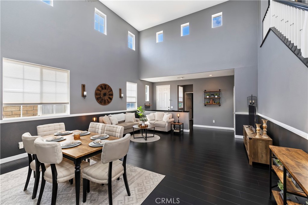 7029 Penny Court Rancho Cucamonga, CA 91739 - Photo 2 of 42 a dining room with wooden floor and large window