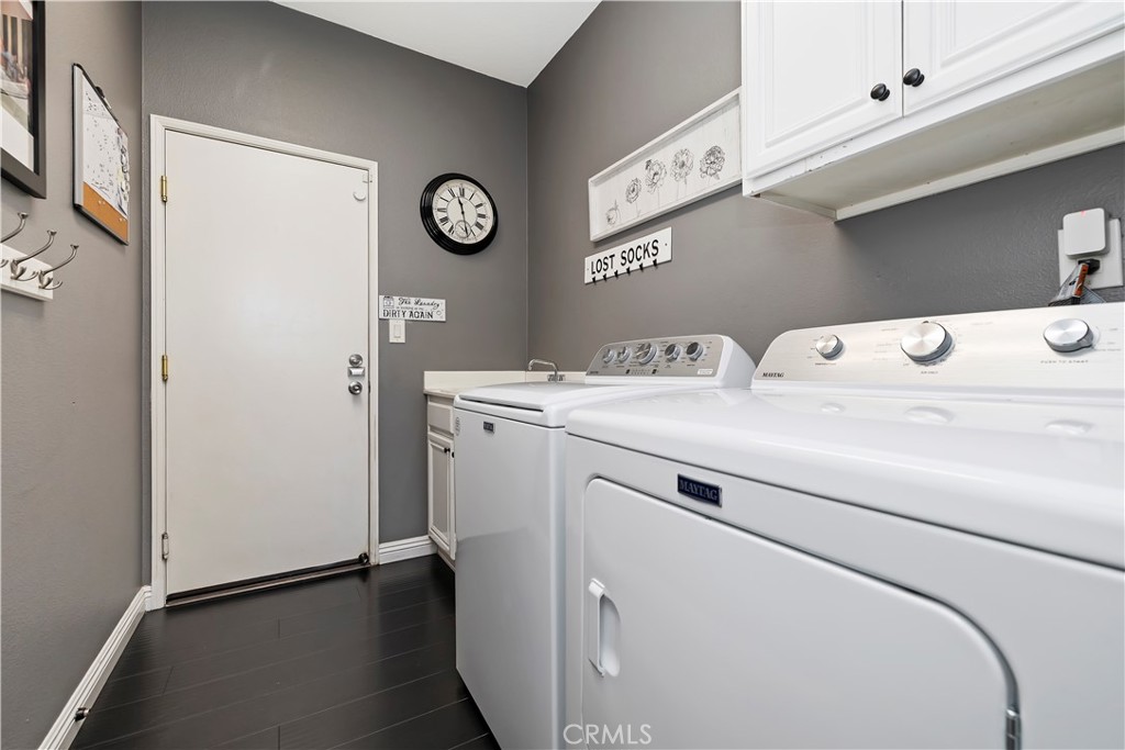 7029 Penny Court Rancho Cucamonga, CA 91739 - Photo 21 of 42 a utility room with dryer and washer