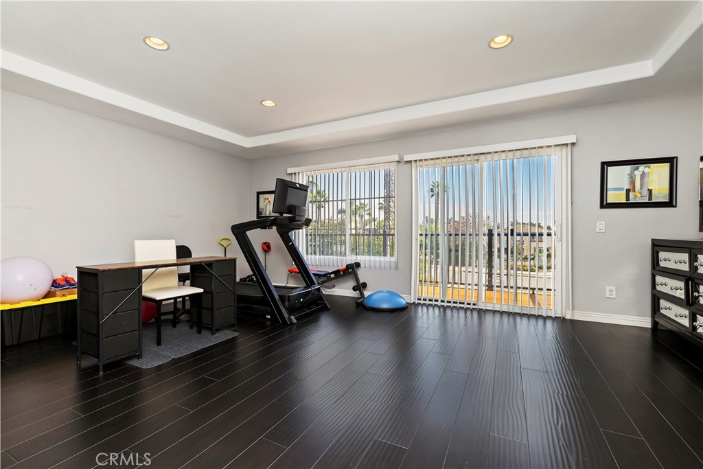 7029 Penny Court Rancho Cucamonga, CA 91739 - Photo 28 of 42 a view of a workspace with furniture and a window