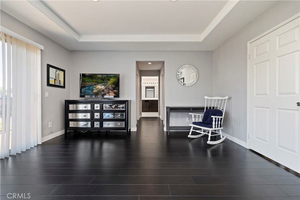 7029 Penny Court Rancho Cucamonga, CA 91739 - Photo 29 of 42 a view of a livingroom with furniture and wooden floor