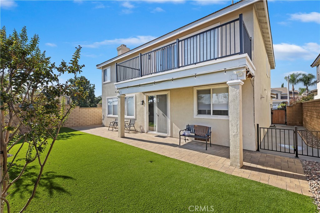 7029 Penny Court Rancho Cucamonga, CA 91739 - Photo 35 of 42 a view of an house with backyard porch and sitting area