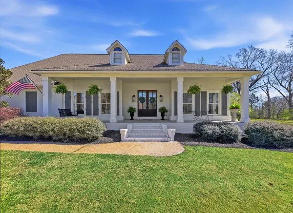 a view of a house with a swimming pool