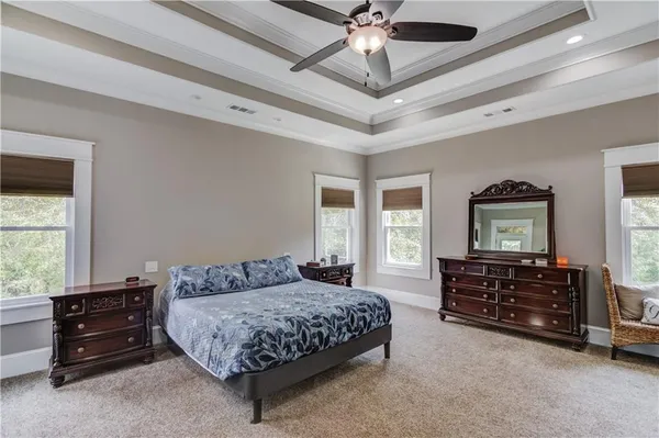 a bathroom with a shower and a sink