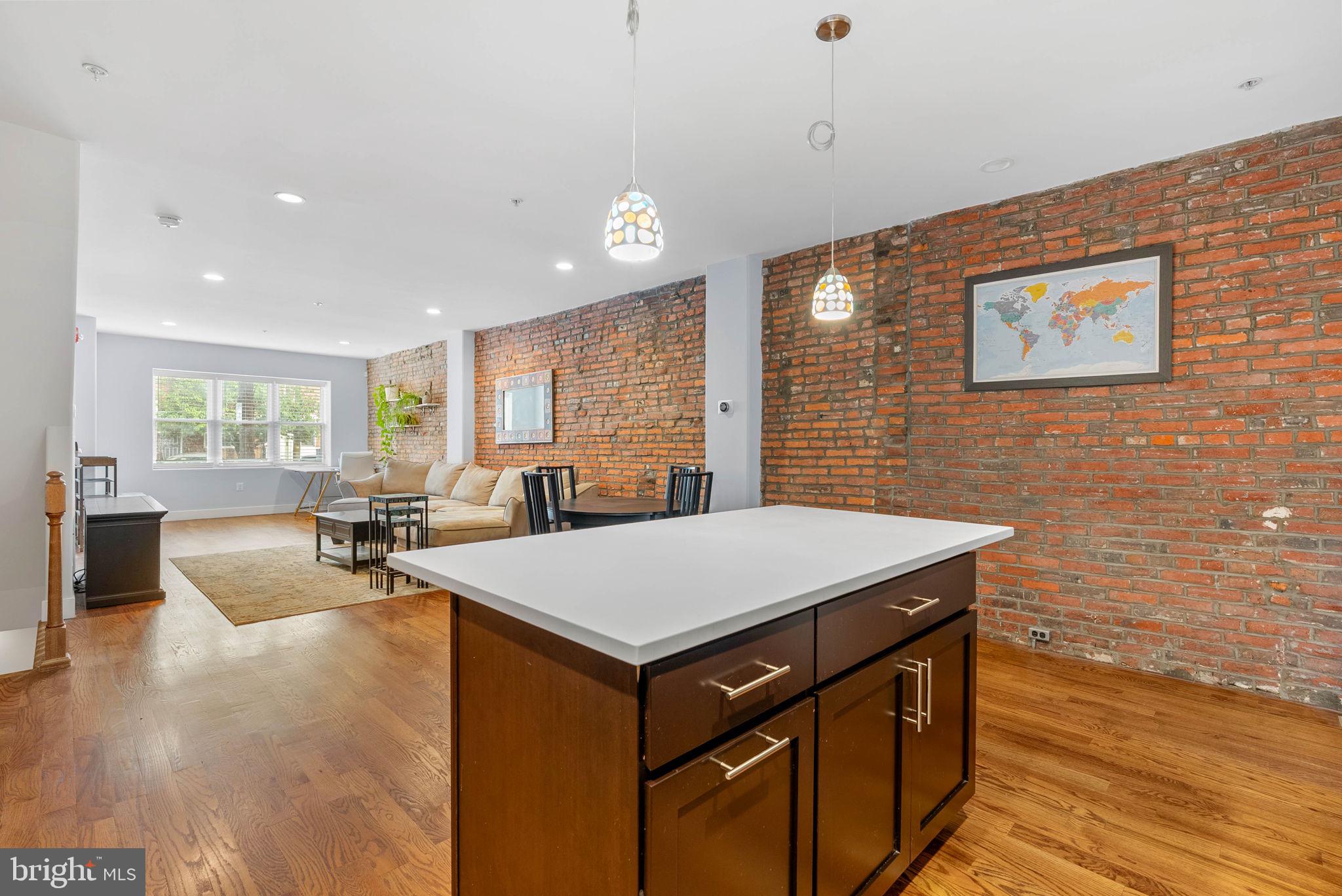 924 South 11th Street, Unit 101 Philadelphia, PA 19147 - Photo 13 of 27 a room with pool table and windows
