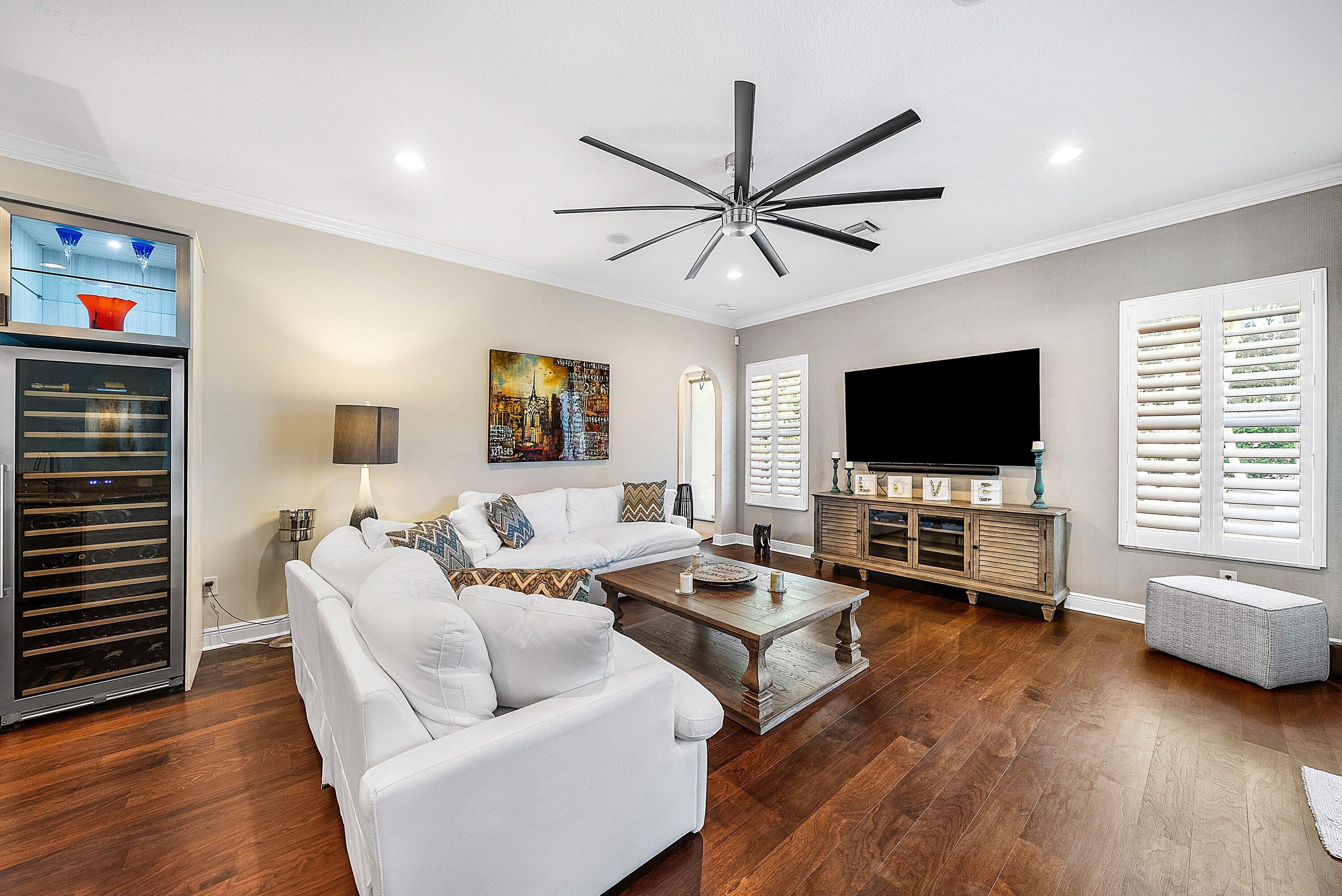 287 Rudder Cay Way Jupiter, FL 33458 - Photo 15 of 88 a living room with furniture and a flat screen tv