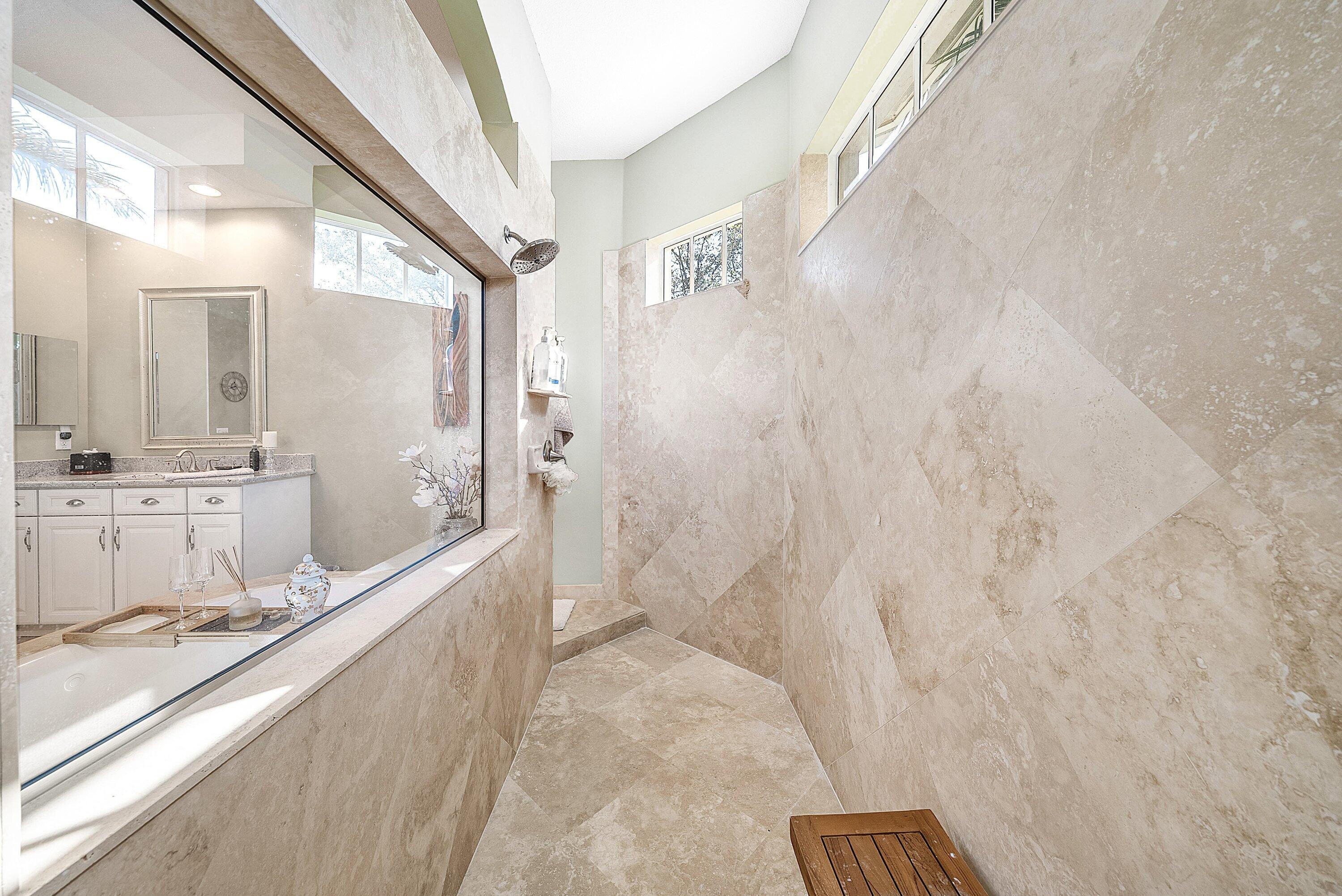 287 Rudder Cay Way Jupiter, FL 33458 - Photo 43 of 88 a large bathroom with a double vanity sink toilet and shower