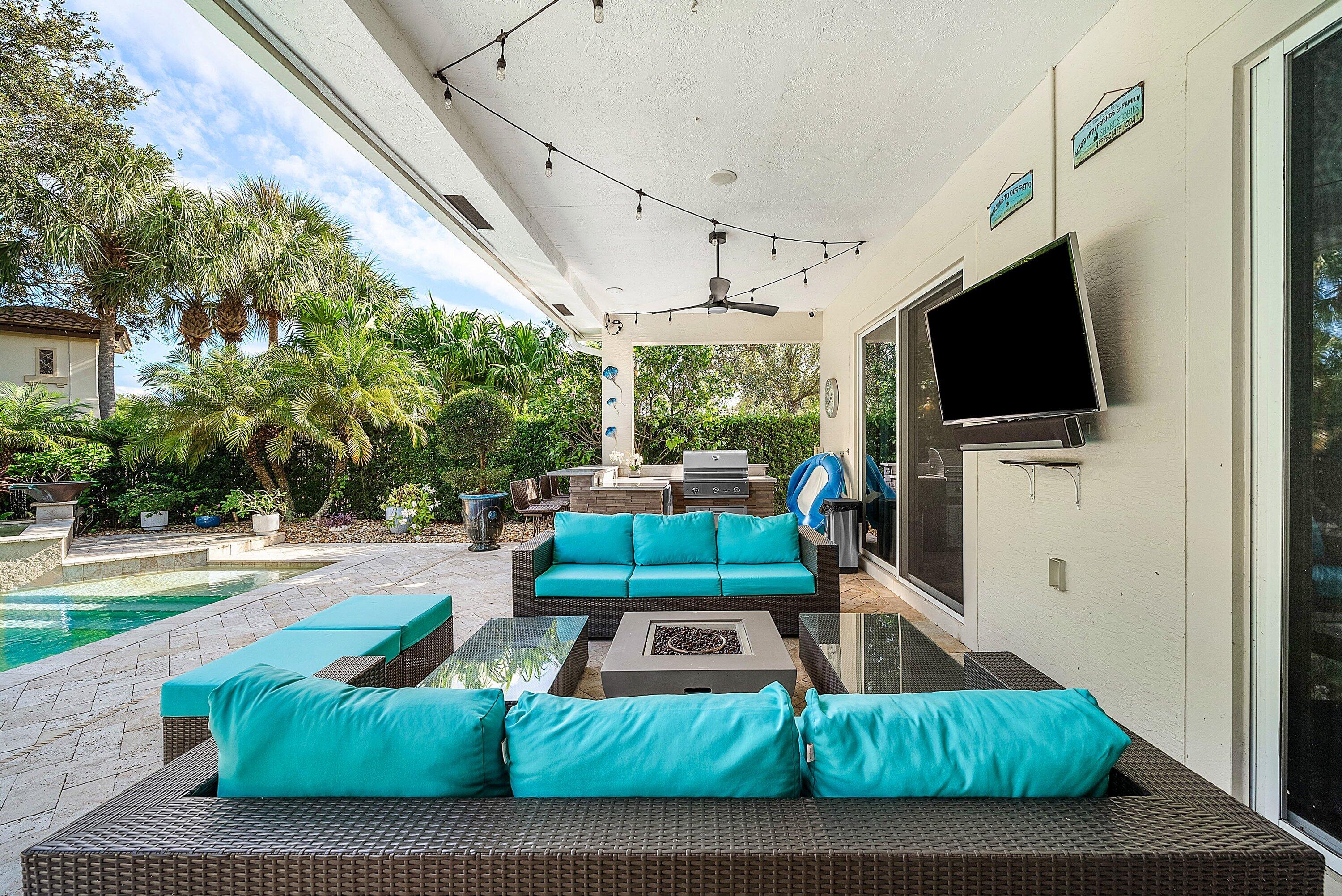 287 Rudder Cay Way Jupiter, FL 33458 - Photo 45 of 88 a view of a living room and a flat screen tv