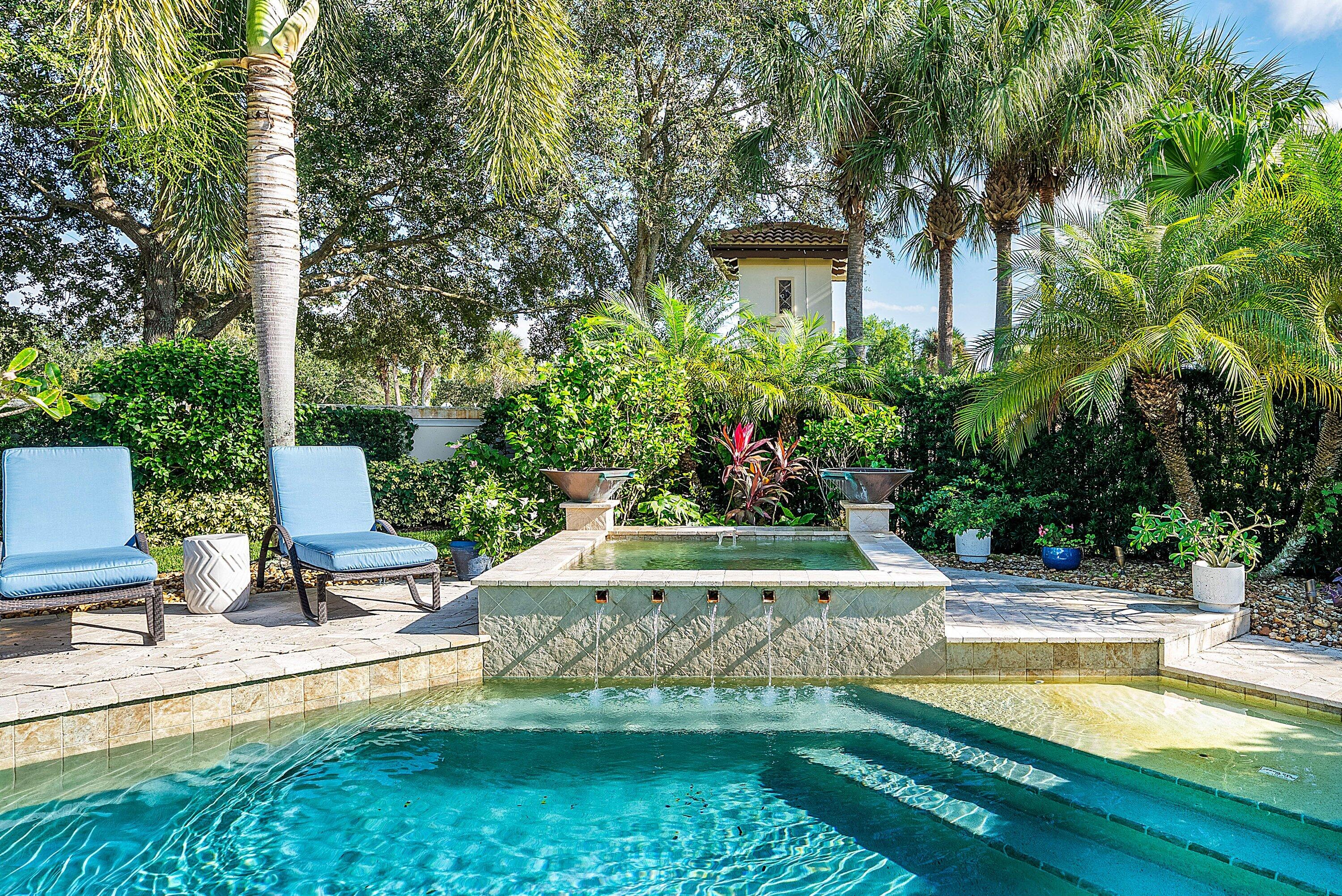 287 Rudder Cay Way Jupiter, FL 33458 - Photo 51 of 88 a view of a house with swimming pool and sitting area