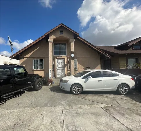 a car parked in front of a house