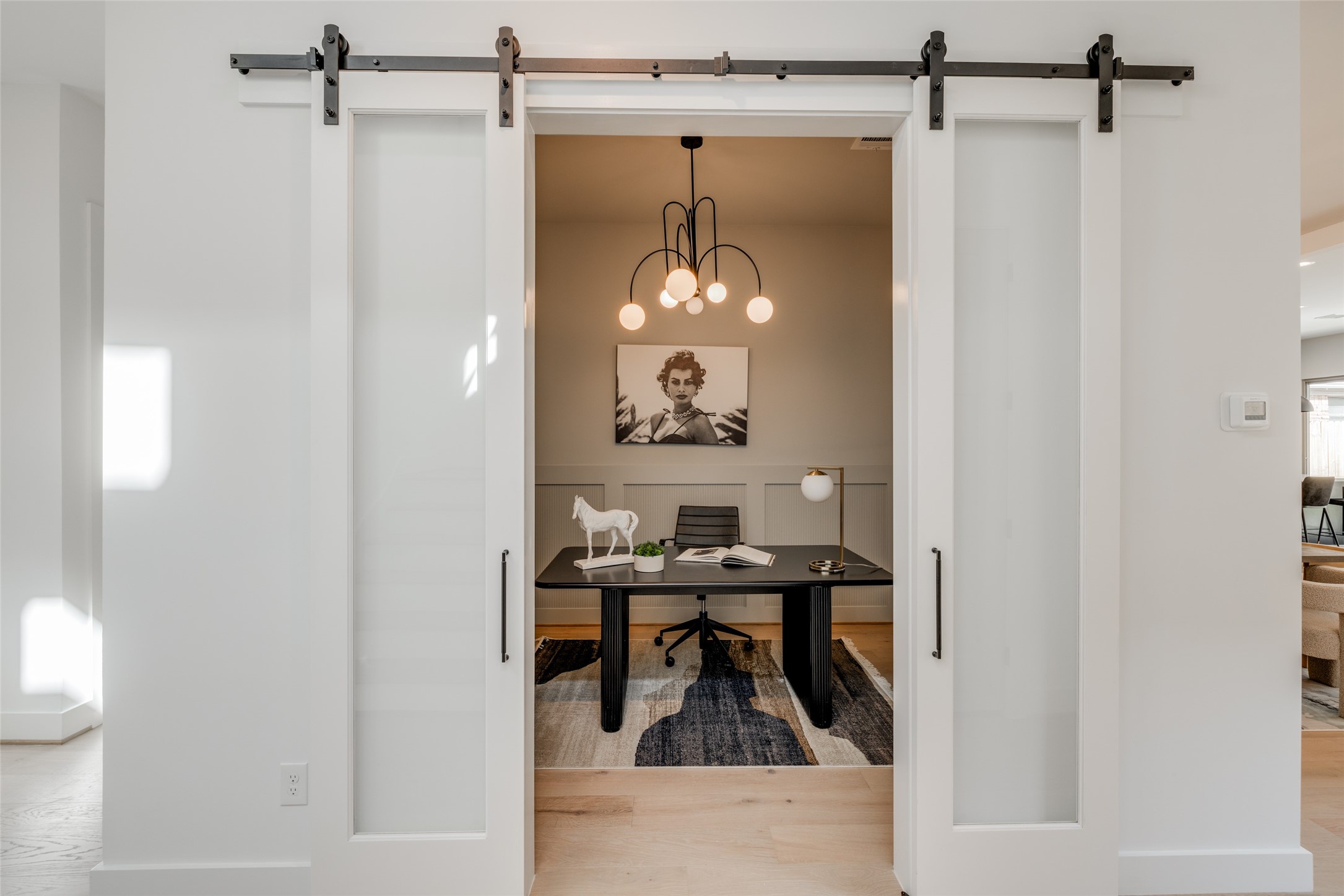 1306 Crocker Street Houston, TX 77019 - Photo 16 of 48 a view of a mirror and a bathroom