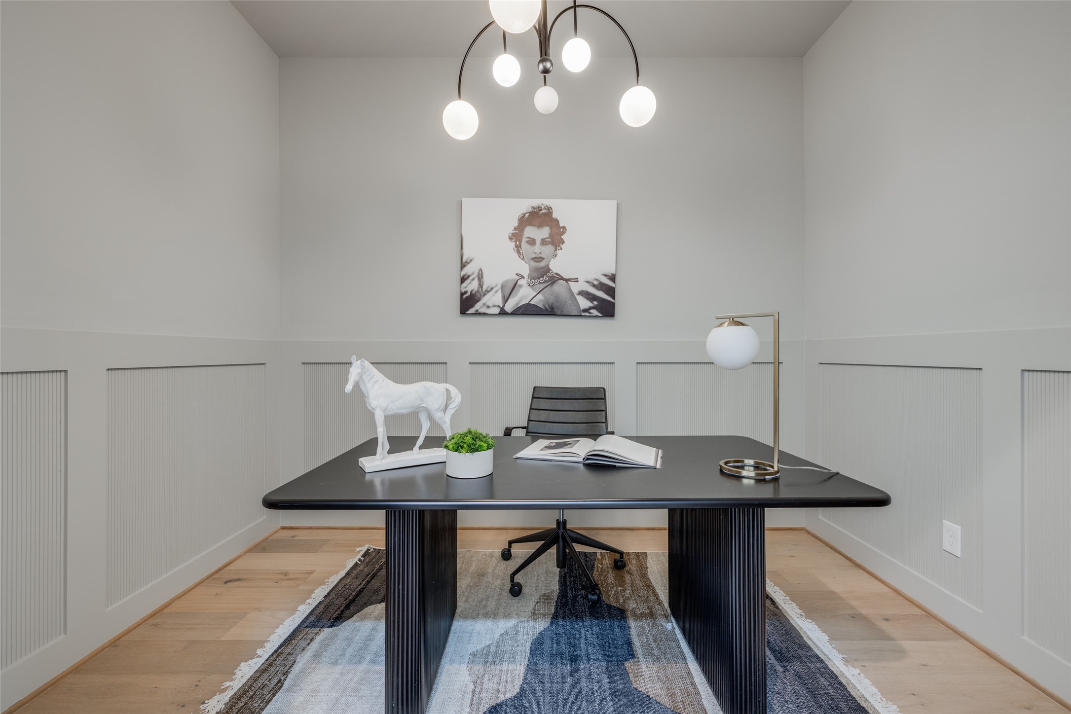 1306 Crocker Street Houston, TX 77019 - Photo 17 of 48 a view of a workspace with furniture