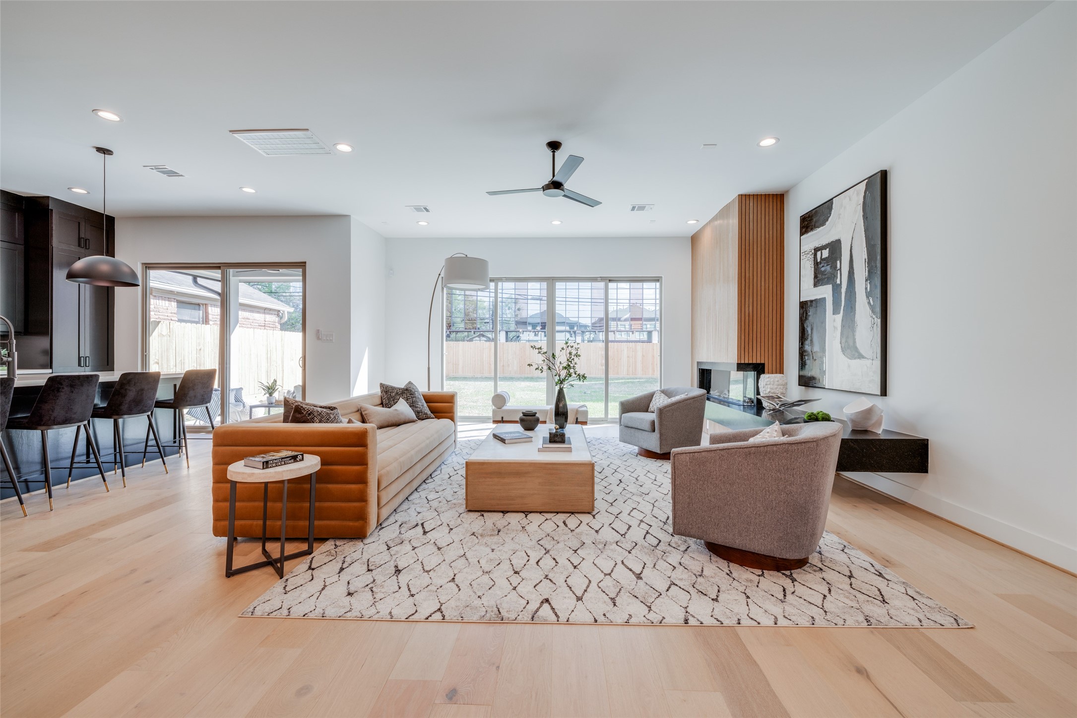 1306 Crocker Street Houston, TX 77019 - Photo 20 of 48 a living room with furniture a large window and wooden floor
