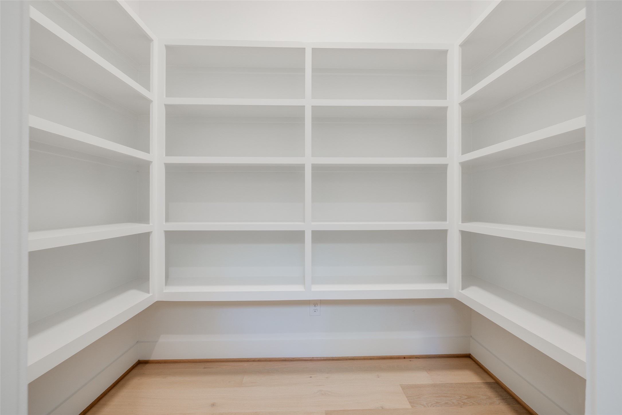 1306 Crocker Street Houston, TX 77019 - Photo 33 of 48 a view of walk in closet with empty racks
