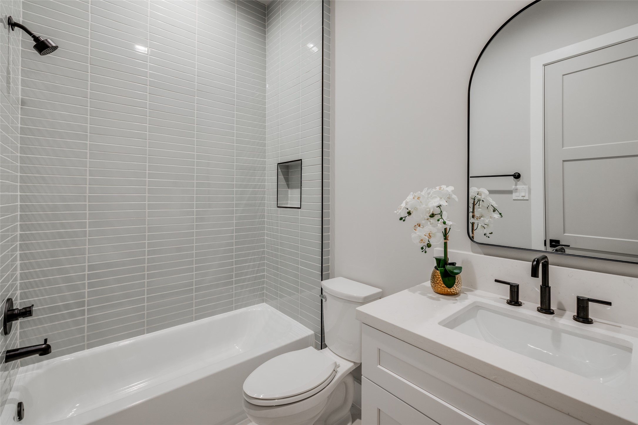 1306 Crocker Street Houston, TX 77019 - Photo 42 of 48 a bathroom with a sink a toilet and shower