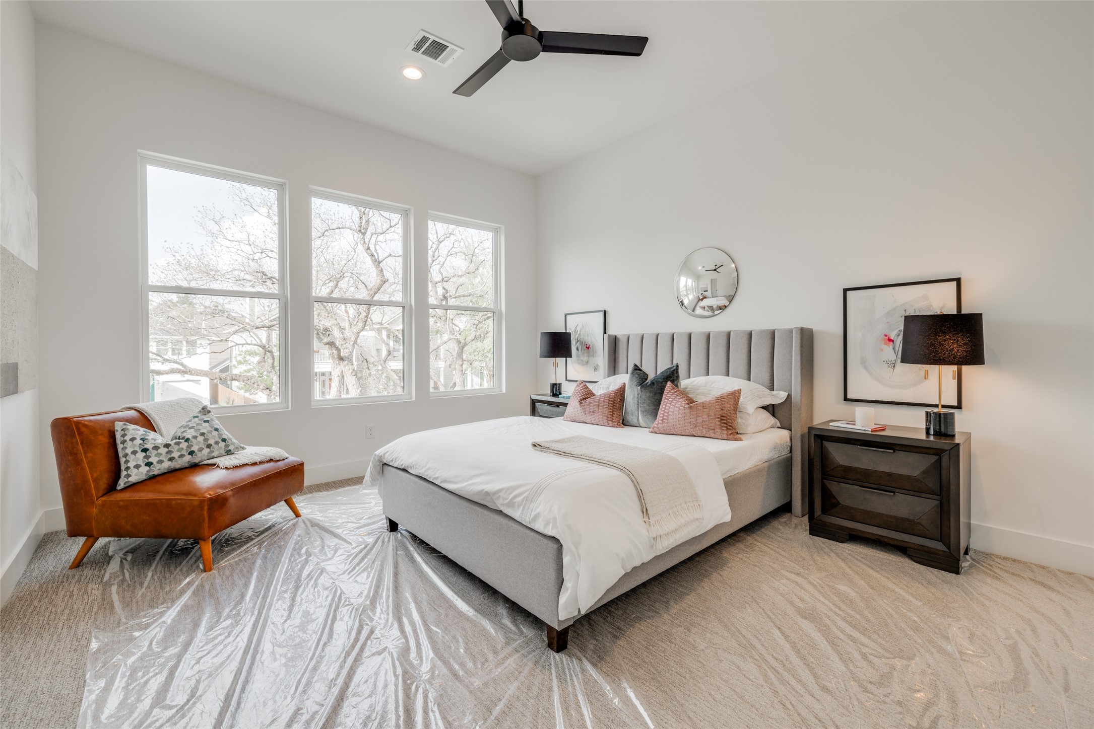 1306 Crocker Street Houston, TX 77019 - Photo 43 of 48 a bedroom with a bed and a couch