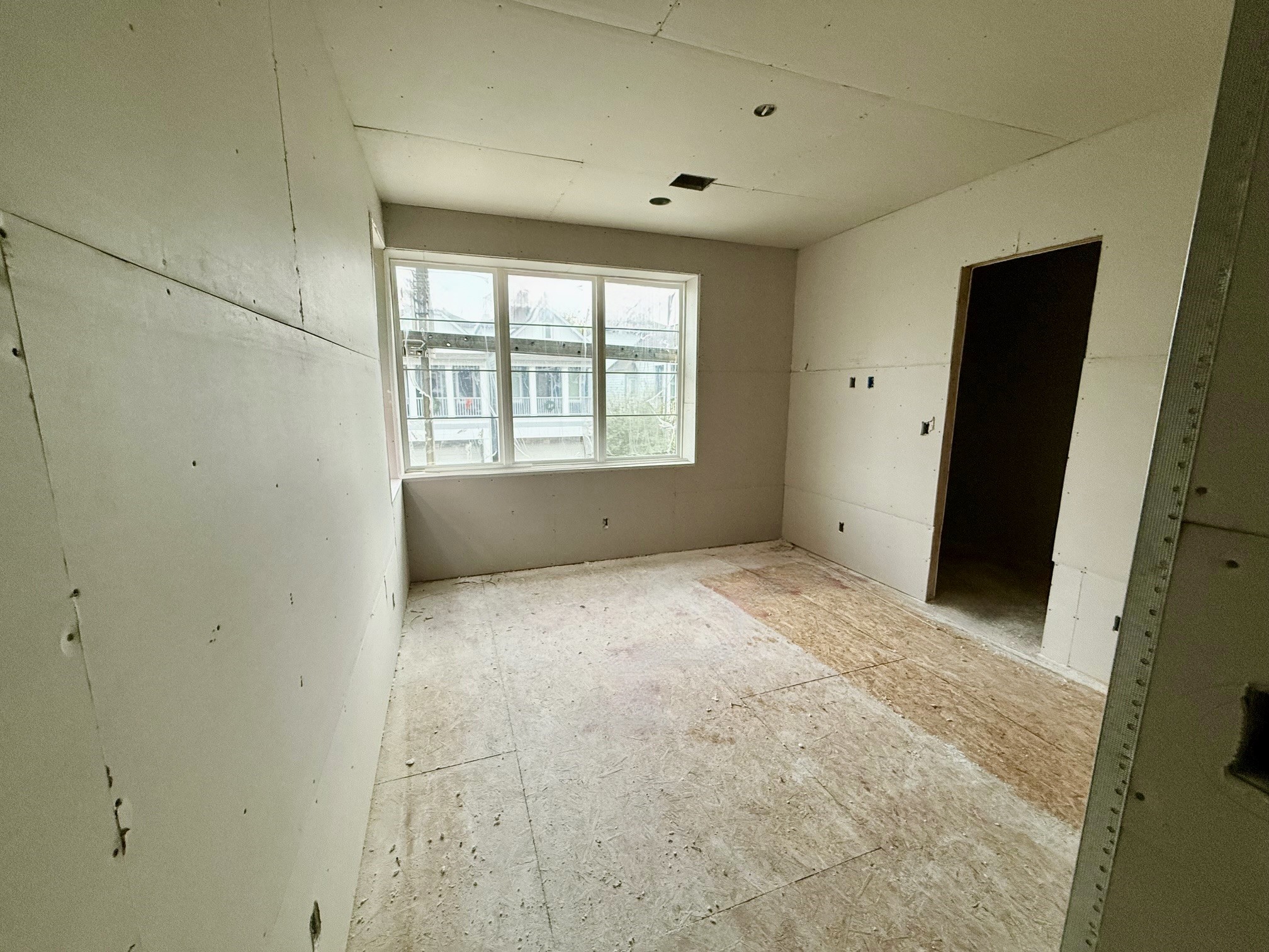 1306 Crocker Street Houston, TX 77019 - Photo 9 of 48 a view of an empty room with a window