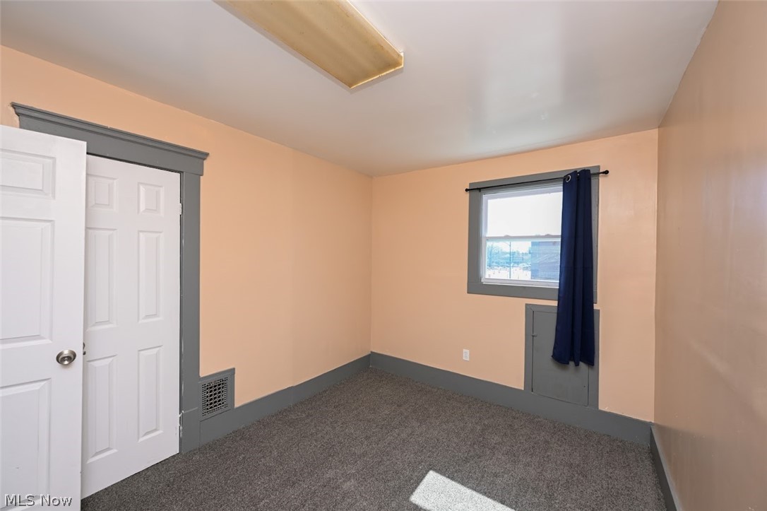 868 North Main Street Akron, OH 44310 - Photo 20 of 30 Unfurnished bedroom featuring carpet floors and baseboards