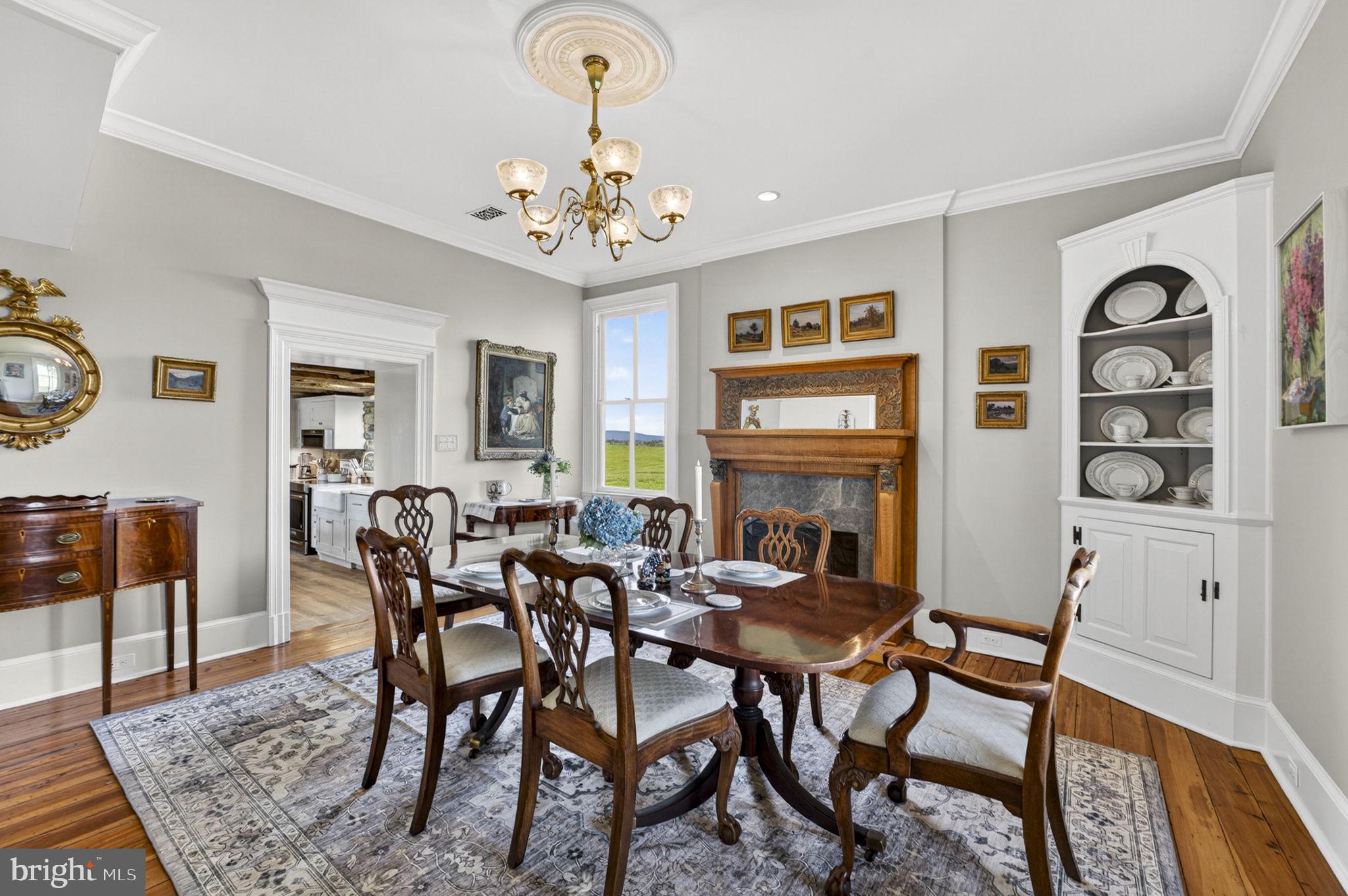 9078 Maidstone Road Delaplane, VA 20144 - Photo 21 of 36 a view of a dining room with furniture