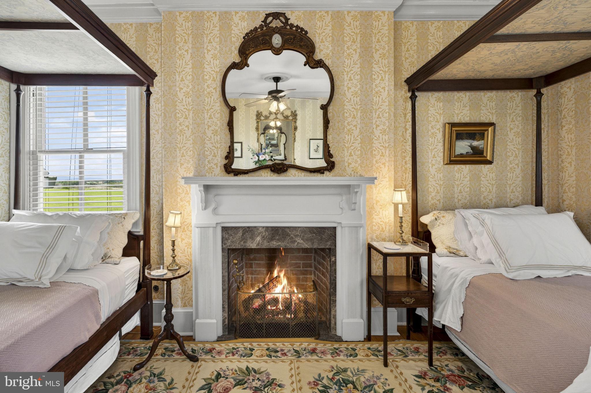 9078 Maidstone Road Delaplane, VA 20144 - Photo 31 of 36 a living room with furniture and a fireplace