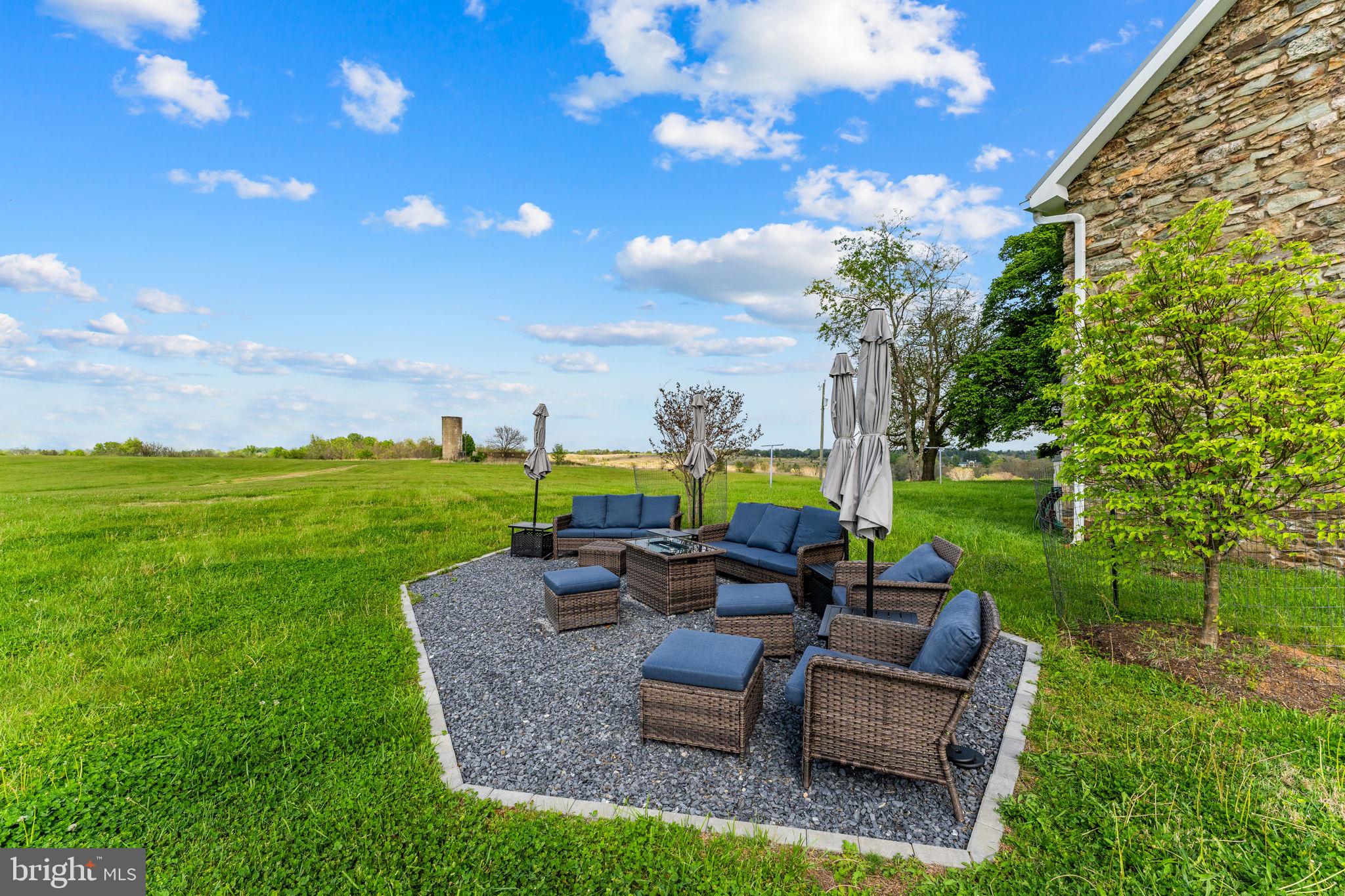 9078 Maidstone Road Delaplane, VA 20144 - Photo 35 of 36 a view of a garden with chairs