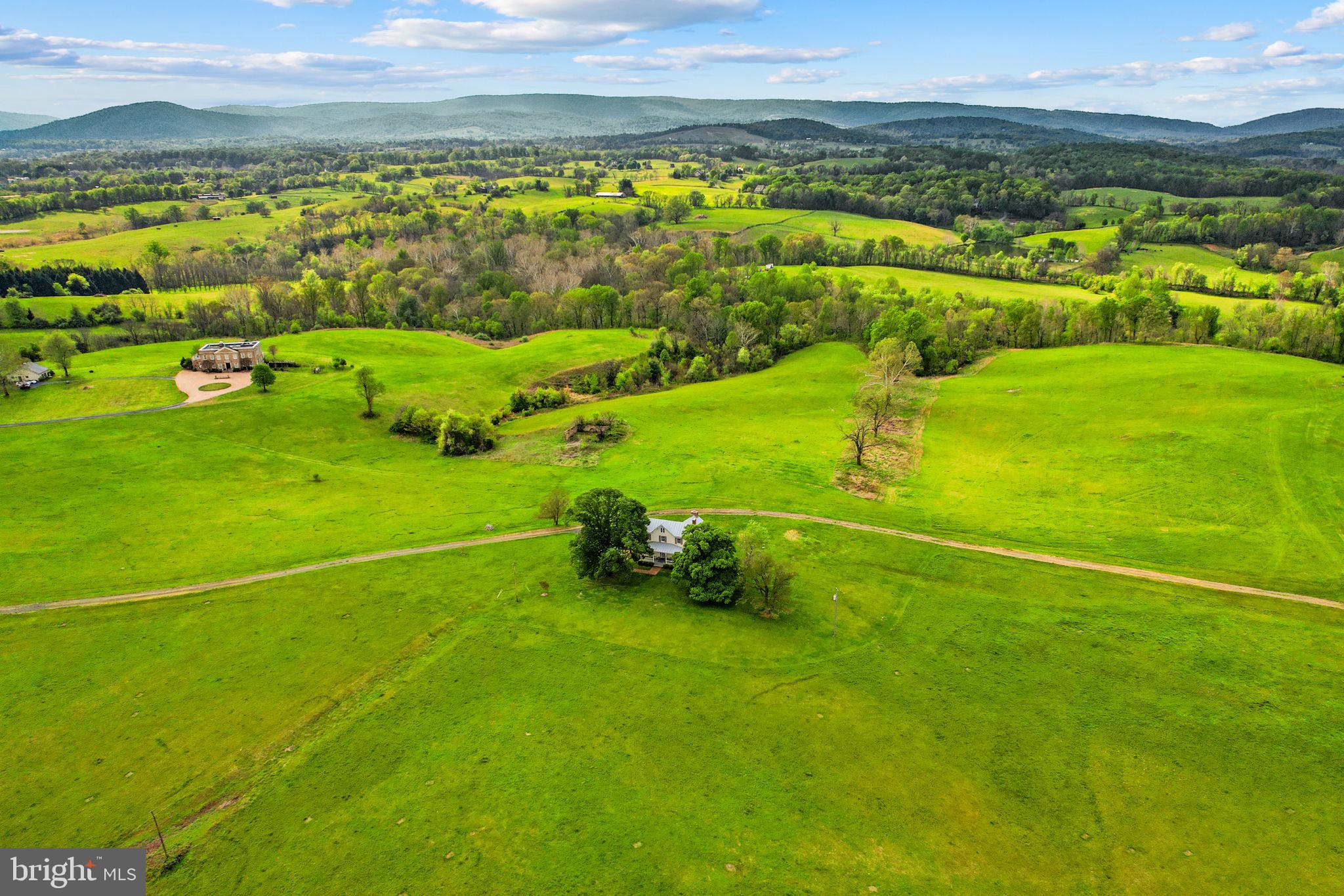 9078 Maidstone Road Delaplane, VA 20144 - Photo 36 of 36 a view of an ocean and a yard