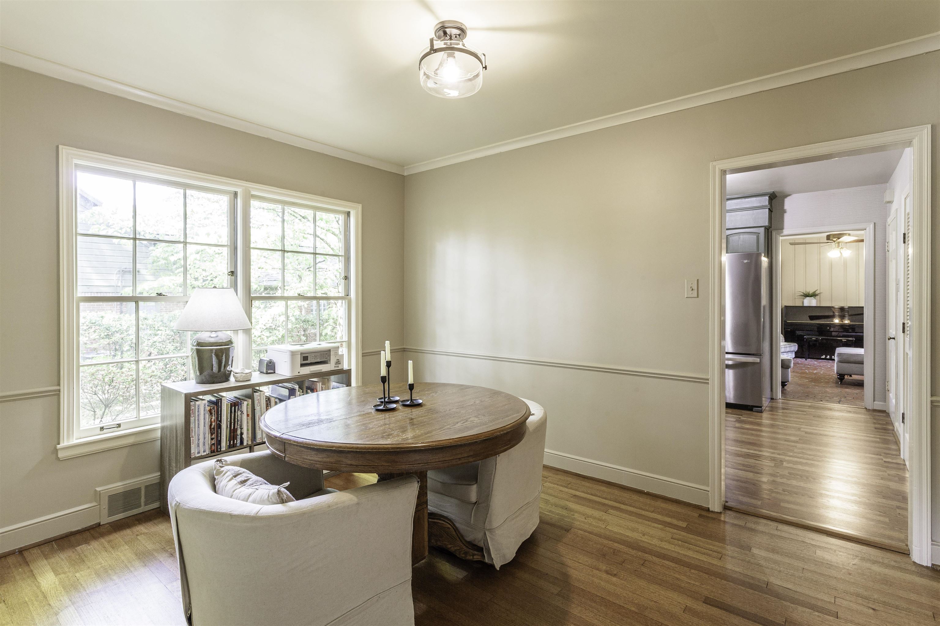 480 Colonial Road Memphis, TN 38117 - Photo 5 of 16 Hardwood flooring paired with light-toned walls and crisp white trim
