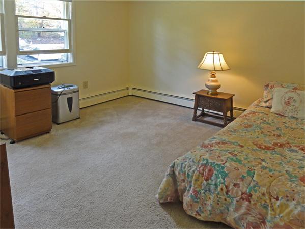 225 Stow Road Harvard, MA 01451 - Photo 12 of 24 a bedroom with a bed and a window