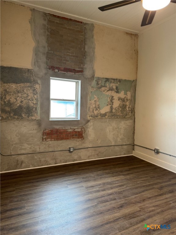 11 South Main Street, Unit 106 Temple, TX 76501 - Photo 2 of 13 a view of a room with wooden floor and window