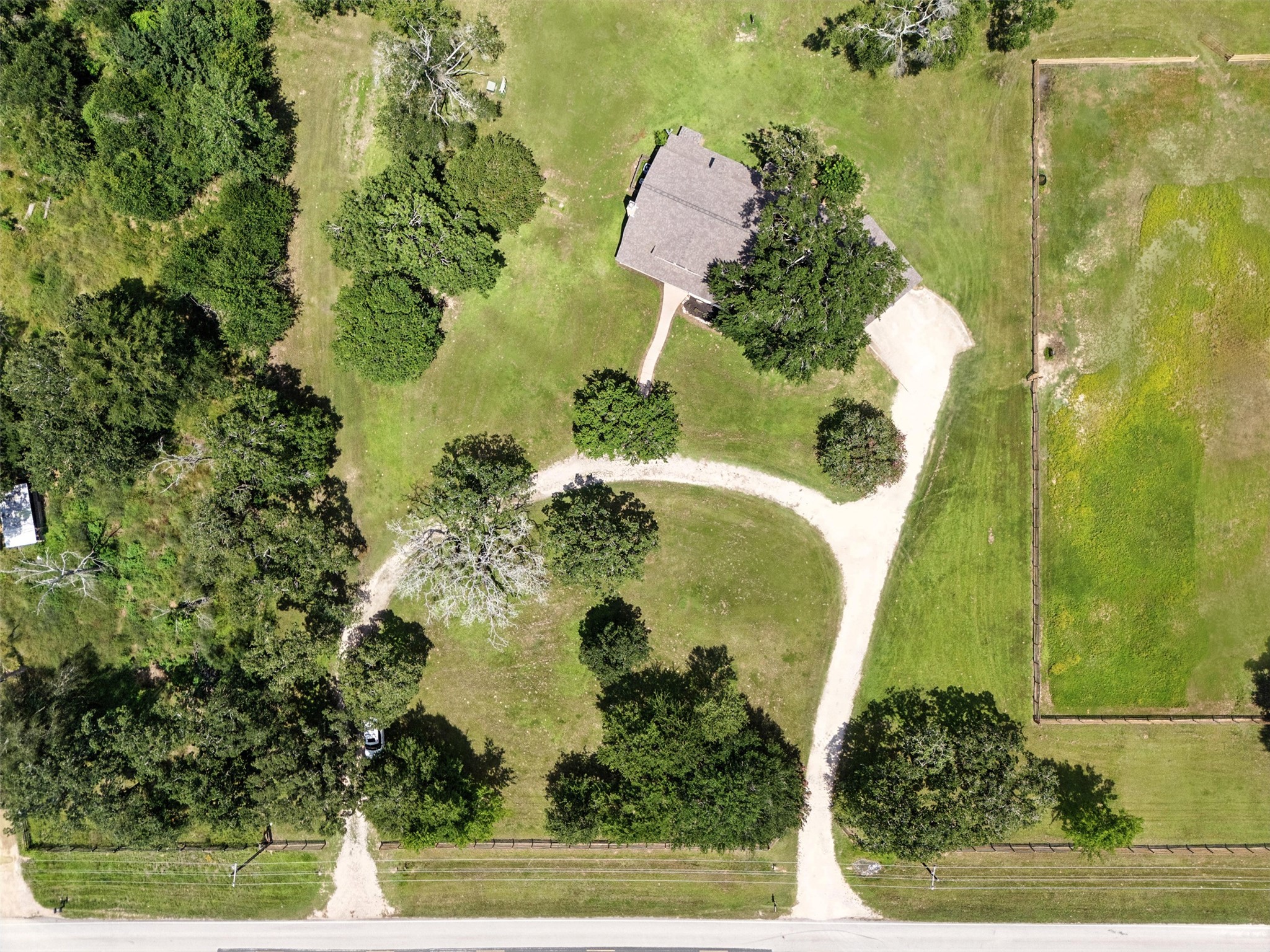 1680 Bowler Road Waller, TX 77484 - Photo 3 of 42 an aerial view of a residential houses with swimming pool