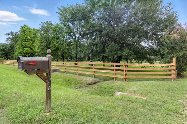 a view of backyard with green space