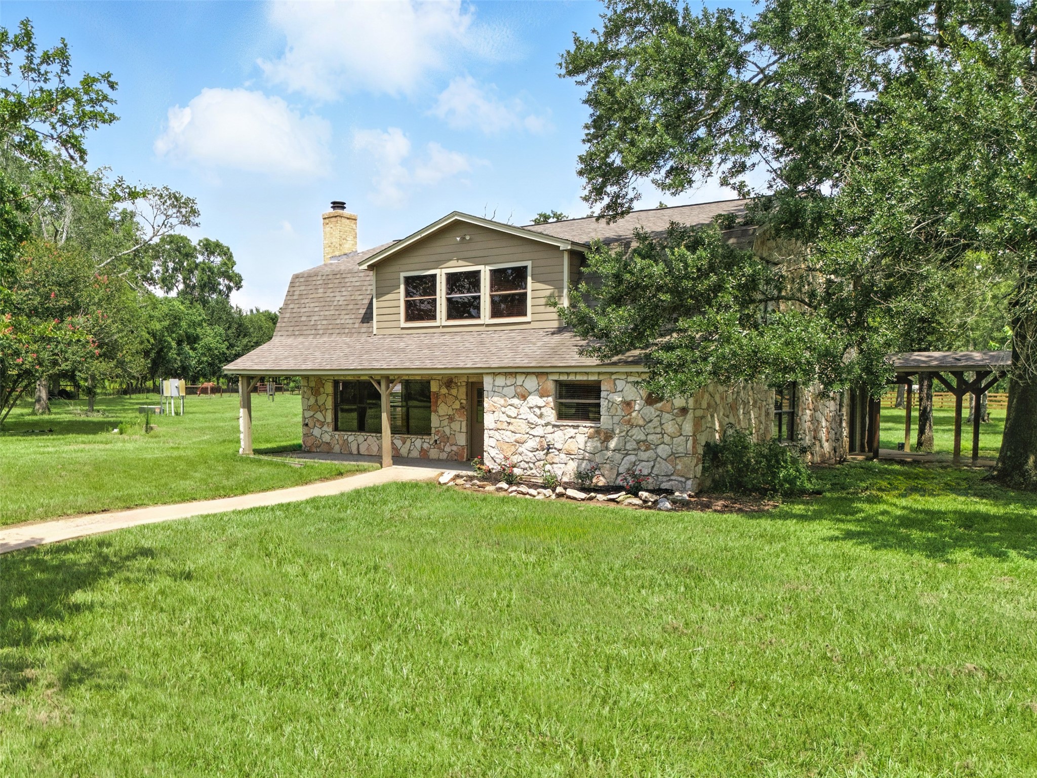 1680 Bowler Road Waller, TX 77484 - Photo 7 of 42 a front view of a house with a yard