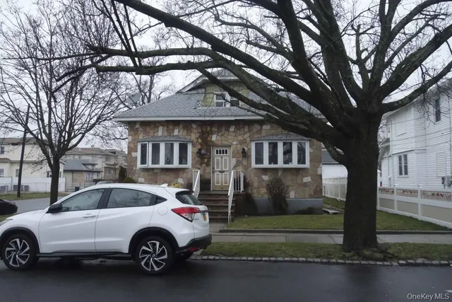 a car parked in front of a house