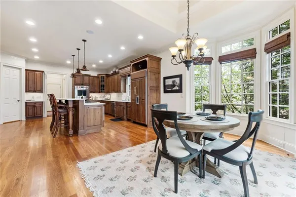 a view of a dining room with furniture window and outside view