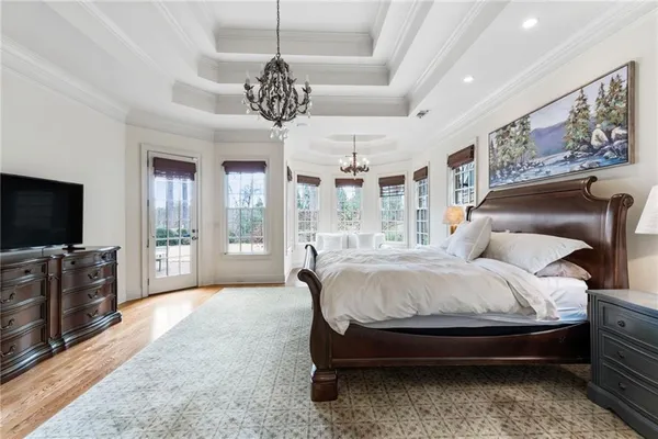 a bath tub sitting next to a shower
