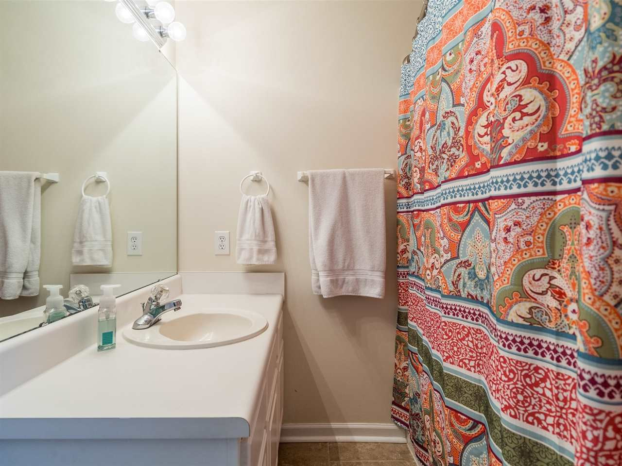 7273 Turner Fish Road Willow Spring, NC 27592 - Photo 17 of 25 The master bath has a tub/shower combination. Master Suite