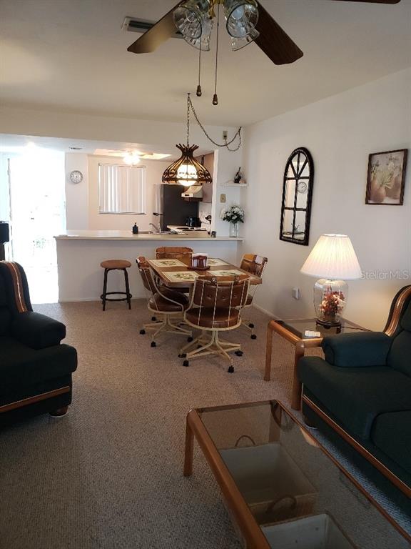25225 Rampart Boulevard, Unit 1908 Punta Gorda, FL 33983 - Photo 4 of 15 a living room with furniture