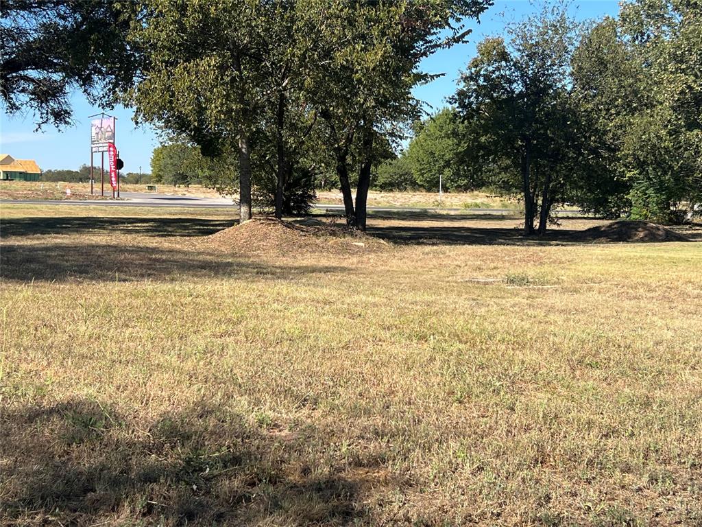 603 A & (601) Swope Street Rio Vista, TX 76093 - Photo 2 of 3 View of green lawn