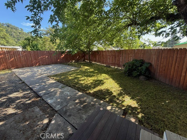 2911 Rancho Vista Drive Lucerne, CA 95458 - Photo 16 of 17 a view of garden with wooden fence