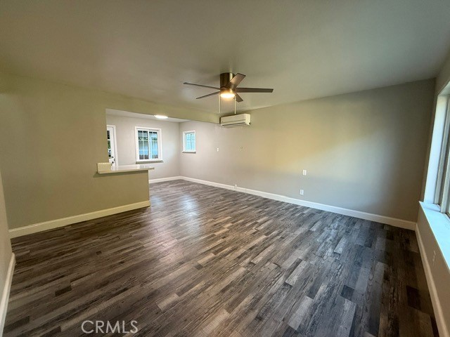 2911 Rancho Vista Drive Lucerne, CA 95458 - Photo 3 of 17 an empty room with wooden floor and windows