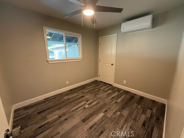 2911 Rancho Vista Drive Lucerne, CA 95458 - Photo 9 of 17 a view of a room with wooden floor and window