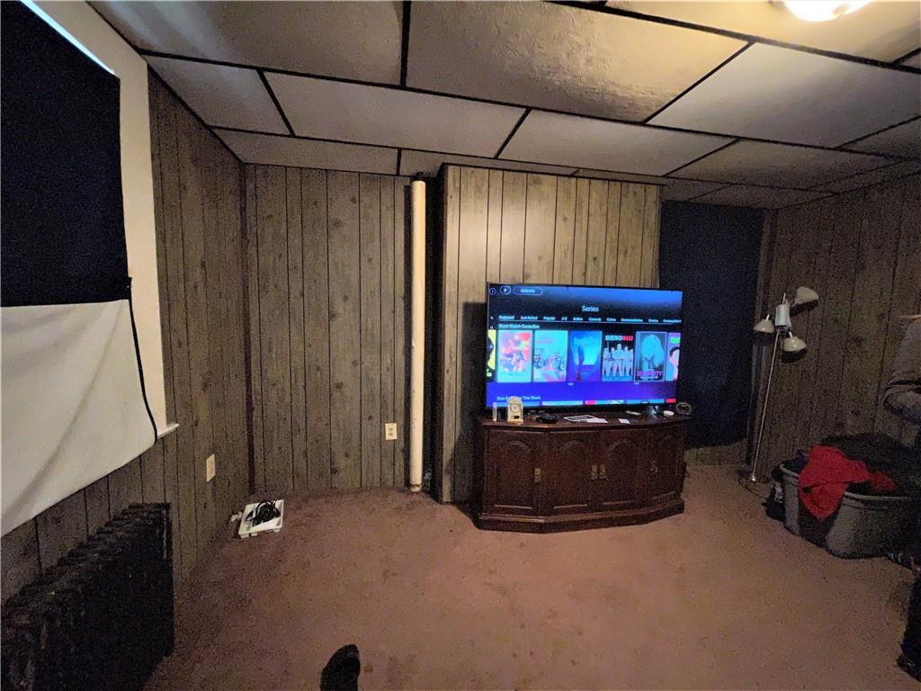 418 11th Street Beaver Falls, PA 15010 - Photo 3 of 6 a room with furniture and a flat screen tv
