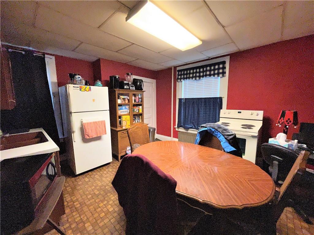 418 11th Street Beaver Falls, PA 15010 - Photo 6 of 6 a bedroom with furniture and a bed